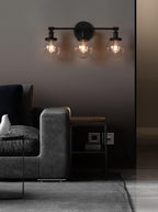 Phansthy 3-Light Wall Sconces Antique Brass Vanity Light, Industrial Wall Lamps with On Off Switch and Clear Glass Lampshade, Vintage Wall Lighting for Bathroom Living Room (Black, Globe Shade)