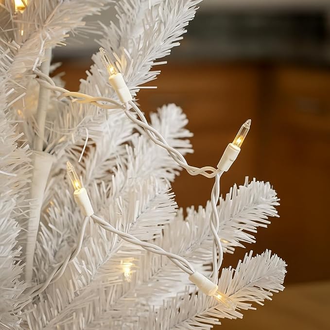 Novelty Lights 50 Feet 100 Bulb Incandescent Mini Light String, Clear with 6-Inch Spacing on White Wire, UL Listed Commercial Grade Indoor/Outdoor Mini Lights, Connectable End-to-End