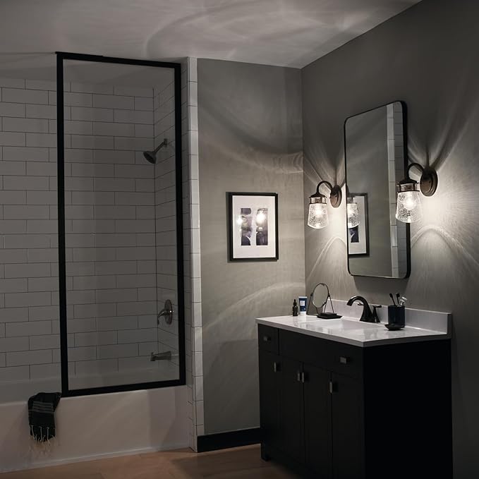 Kichler Lyndon 11.25" Wall Sconce in Architectural Bronze, 1-Light Indoor Outdoor Wall Light with Clear Seeded, (11.25" H x 5" W), 49444AZ