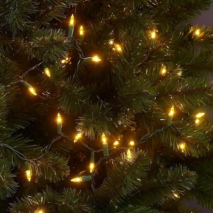 Novelty Lights 11 Feet 50 Bulbs Traditional Incandescent Mini Lights, Yellow on Green Wire with 2.5" Spacing, Commercial Grade and UL Listed for Indoor/Outdoor Use, End-to-End Connectable